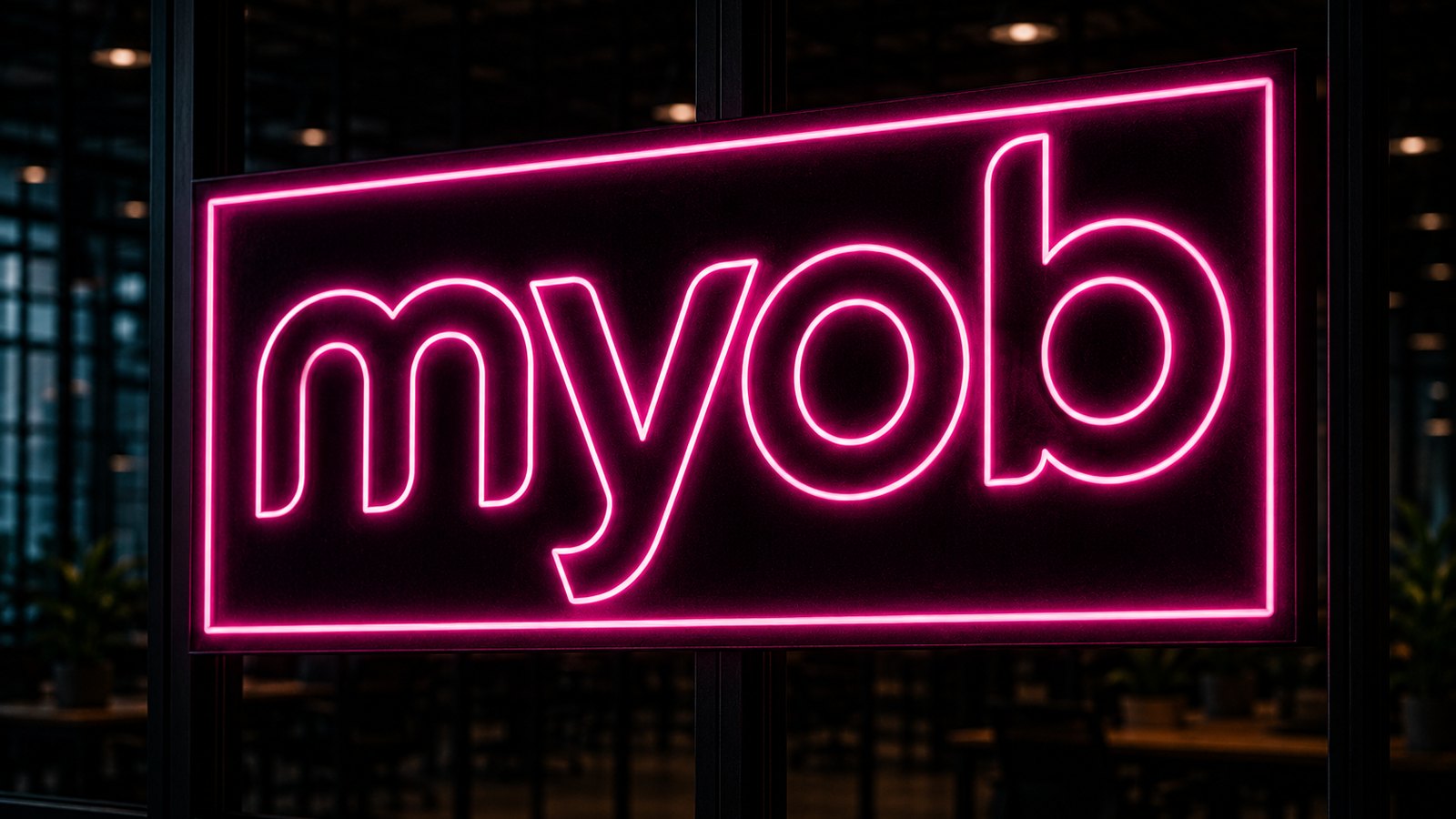 MYOB neon sign glowing in a darkened accounting office